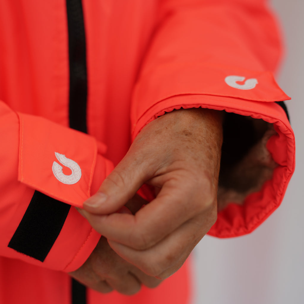 Coucon Changing Robe Adult Long Sleeve - Fluoro Orange (Limited Edition) Detail Shot Cuff adjuster